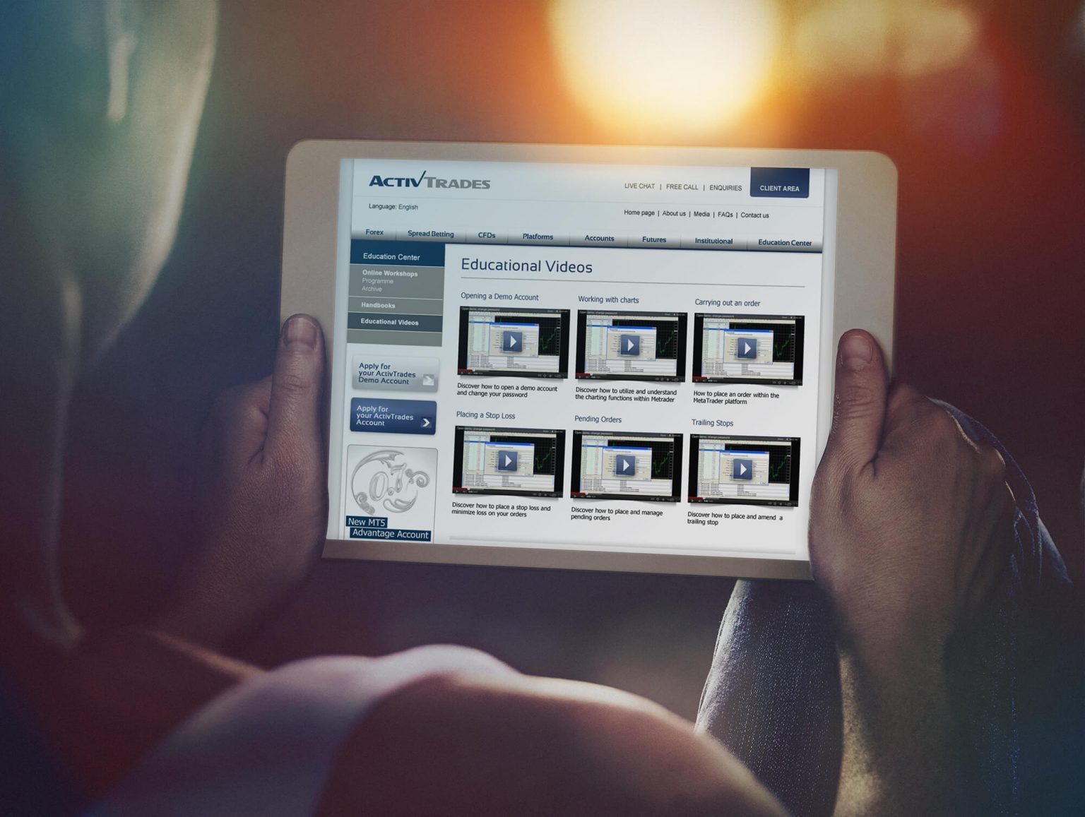 ActivTrades financial markets website displayed on a tablet