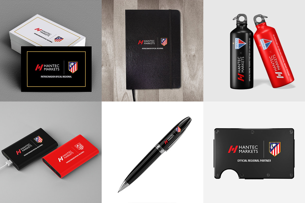 Hantec Markets branded merchandise including notebook, bottles, pen and cards