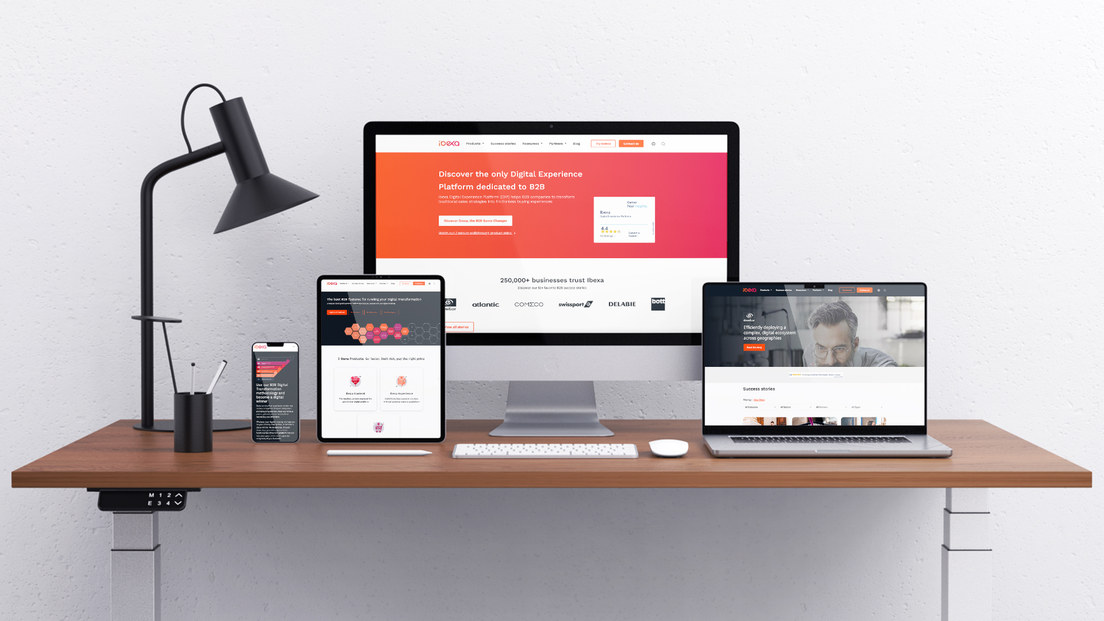 Ibexa website displayed across desktop, tablet and laptop