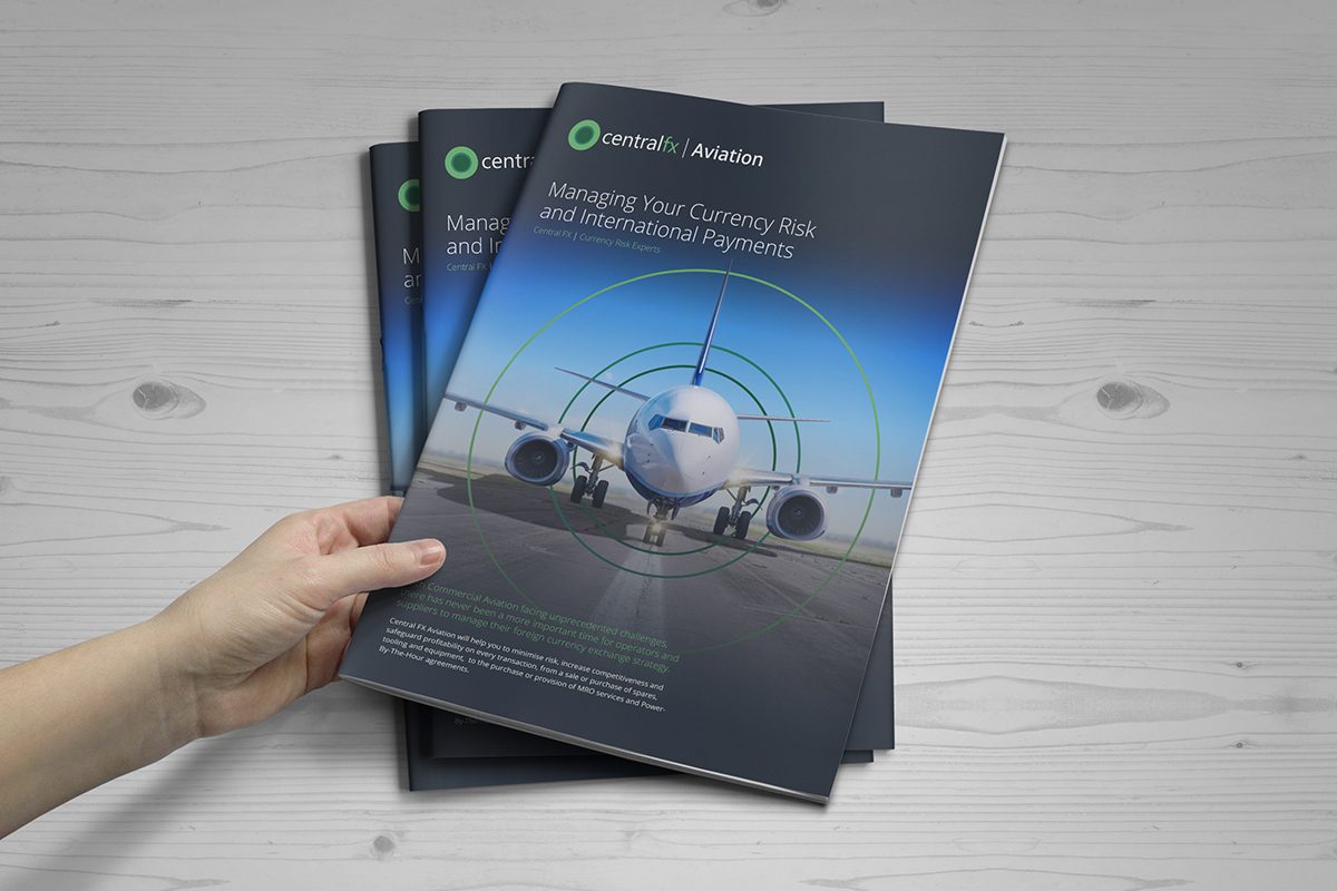 Central FX travel industry brochure held in hand
