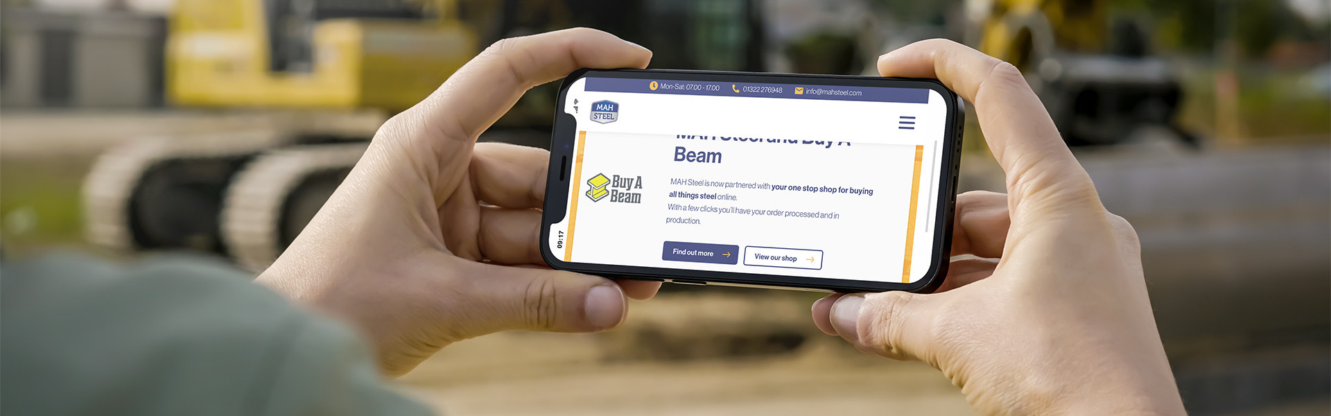 MAH Steel mobile website shown on a smartphone at a construction site